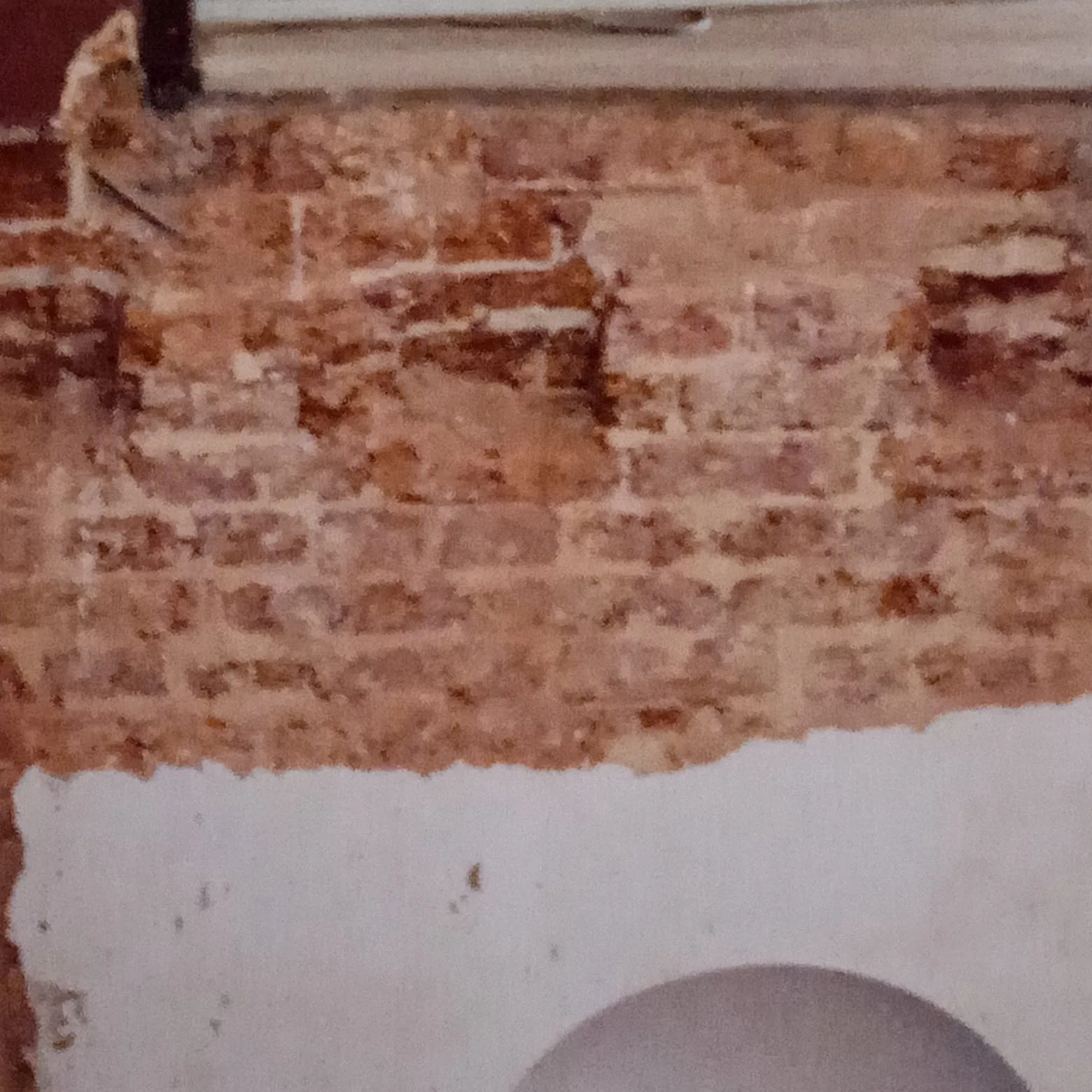 Exposed historic masonry requiring restoration